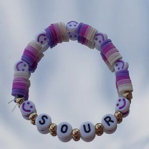 Clay bead stretchy string bracelet When you buy 2 you get 1 free bracelet!